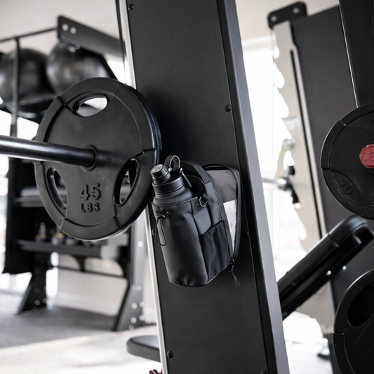 MagnaFlex Gym Bag - Magnetic Bag attached to gym equipment with water bottle, designed for easy access and convenience.